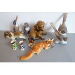 A selection of various porcelain models of animals to include a Rosenthal model of a puppy, a