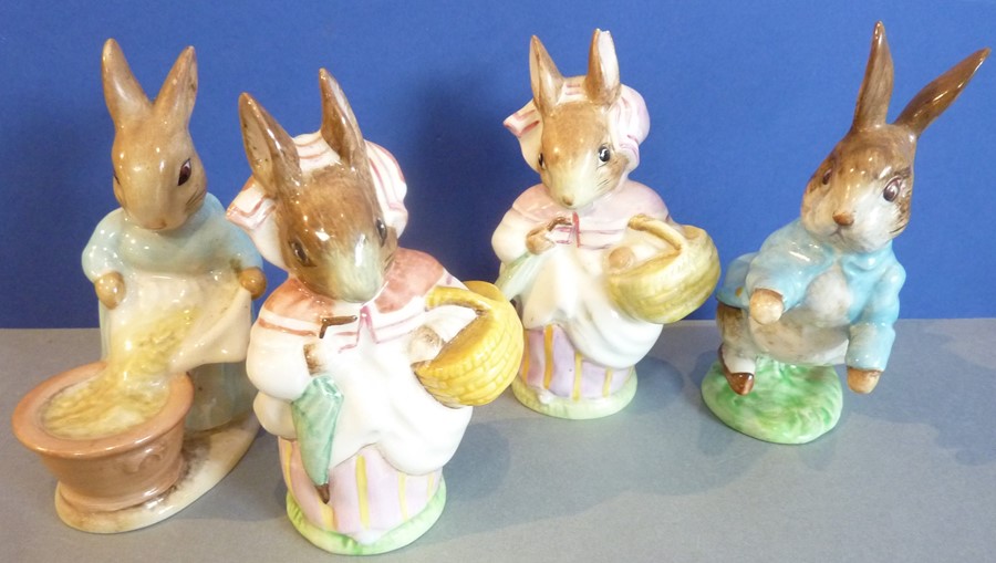 Four Beswick Beatrix Potter figures: Peter Rabbit (1948), Cecily Parsley and Mrs Rabbit (left ear