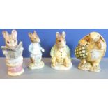 Four Beswick Beatrix Potter figures: Tailor of Gloucester, Johnny Town-Mouse, Samuel Whiskers and Mr