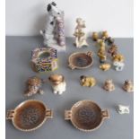 An assortment of small ornamental porcelain wares to include a late 19th century porcelain bookend