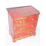 A miniature red-lacquer chest gilded and decorated with chinoiseries, shaped apron and raised on