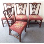 A set of four late 19th / early 20th century mahogany salon chairs in 18th century Chippendale