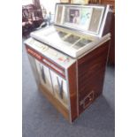 A Wurlitzer Lyric console Stereo De-Luxe jukebox for restoration (this item has recently been