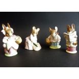 Four Beatrix Potter figures: Tailor of Gloucester (1949), Mrs Tittlemouse, Mrs Rabbit (1951) and
