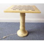 An alabaster occasional table, the chessboard top above a turned columnThe dimensions of the