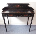 A late Regency period painted and ebonised washstand; three-quarter galleried top decorated with