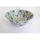 An early 19th century Chinese bowl salvaged from the 1822 Tek Sing wreck; decorated with