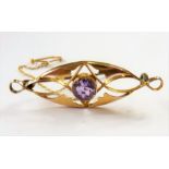 A Victorian 9-carat gold and amethyst bar-brooch (The cost of UK postage via Royal Mail Special
