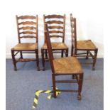 A good set of four well-patinated elm/oak Lancashire ladderback chairs; rush seats and turned