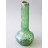 An early 20th century Loetz-style iridescent glass vase having silver-mounted rim