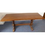 An oak refectory table on shaped ends, pierced with heart-style motifs (180cm x 72cm)