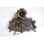 19th century eight-day French slate and metal-mounted mantel clock for restoration, the black dial