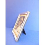 A hallmarked silver easel picture frame, Birmingham 1911