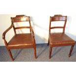 A Regency period mahogany open armchair with overstuffed top and turned tapering legs, together with