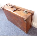 An early 20th century hand-stitched brown-leather suitcase with reinforced leather corners