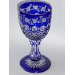 A large 19th century Bohemian-style flash-cut goblet, waisted stem and on circular-style cut base (