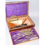 A mid-19th century rosewood-cased draughtsman's drawing instrument set with single removable tray
