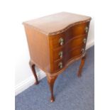 An inverted serpentine-fronted walnut chest; three full-width drawers above cabriole legs (51cm