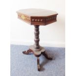 A mid-19th century continental octagonal oak work table; the hinged lid above a tall turned stem and