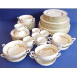 A Royal Worcester part-dinner service in the 'Saguenay' pattern comprising dinner plates, side