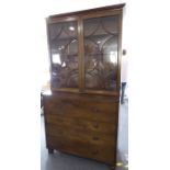 A good early 19th century George III period mahogany secretaire bookcase; outset cornice above two