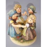 A large Hummel porcelain figure group, 'Ring around the Rosie' (18cm high, 16.25cm diameter of