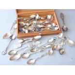 An interesting selection of silver and silver-plated commemorative-style spoons etc. (some
