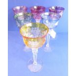 A set of six multi-coloured Bohemian style hand-cut hock glasses