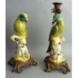 A highly decorative opposing pair of porcelain candlesticks with bronze mounts and modelled as