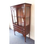 A good and unusual early 20th century mahogany and marquetry display cabinet; the two glazed doors