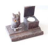 A Black Forest inkwell with a glass-eyed carved owl (15cm wide)