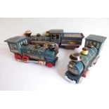 Three tin-plate Western and Great Western steam locomotives (battery powered and in need of