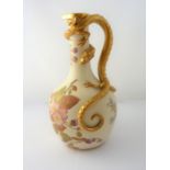 A late 19th century Royal Worcester baluster-shaped blush porcelain jug; hand-gilded and decorated