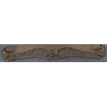 An ornate serpentine-fronted 19th century cast-iron fire curb, pierced decoration of leaves and