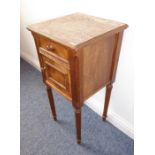 An early 20th century marble-topped (broken) French walnut pot cupboard on turned tapering legs (