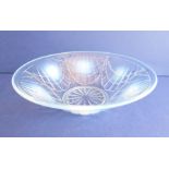 A moulded opalescent glass bowl in the style of the Lalique 'Coquilles' design with impressed