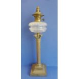 A heavy brass oil lamp modelled as a Corinthian column having cut-glass reservoir (68cm high)