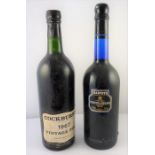 A bottle of Cockburn's 1967 vintage port together with a bottle of Harvey's Bristol Cream Sherry (