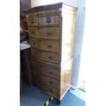 A fine reproduction serpentine-fronted walnut chest-on-chest, the outset cornice above two half-