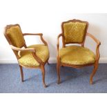 A pair of Louis XV style (later) carved and upholstered fauteuils on moulded cabriole front legs