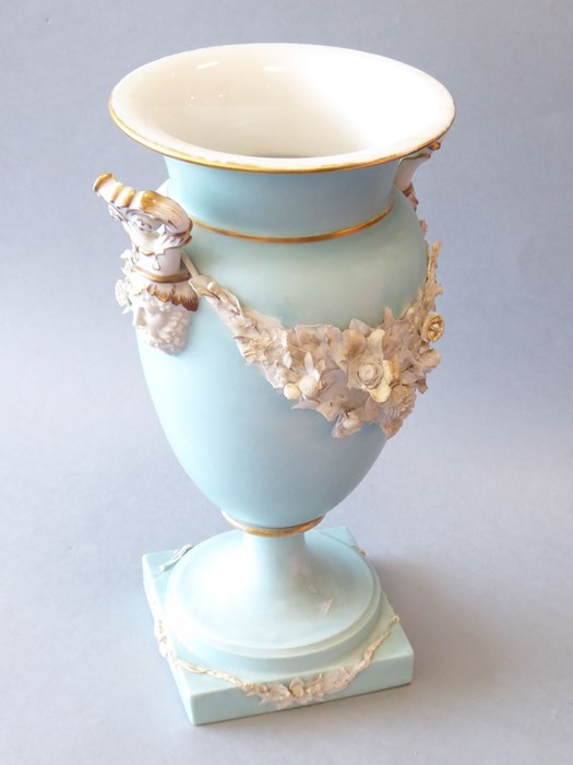 A 19th century Continental two-handled baluster-shaped porcelain vase of neo-classical