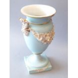 A 19th century Continental two-handled baluster-shaped porcelain vase of neo-classical