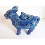 An interesting Chinese blue-glaze pottery censer modelled as a mythical beast; complex six-character