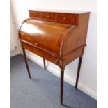 A French elm and kingwood cross-banded cylinder bureau, three frieze drawers above the cylinder