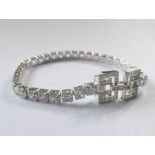 A Deco style silver and CZ bracelet (The cost of UK postage via Royal Mail Special Delivery for this