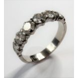 An 18-carat white-gold half-eternity ring set with six diamonds (approx. 2 carats) (The cost of UK