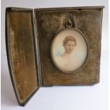 An early 20th century shoulder-length miniature of a lady in its case