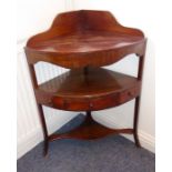 A George III bow-fronted mahogany washstand; galleried top above single bow-fronted drawer flanked