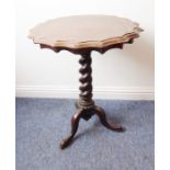 A mid-19th century rosewood occasional table; the thumbnail-moulded scallop-edged top above a