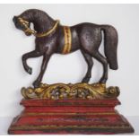 A 19th century painted cast-iron doorstop modelled as a prancing horse (approx. 27cm wide and 27cm